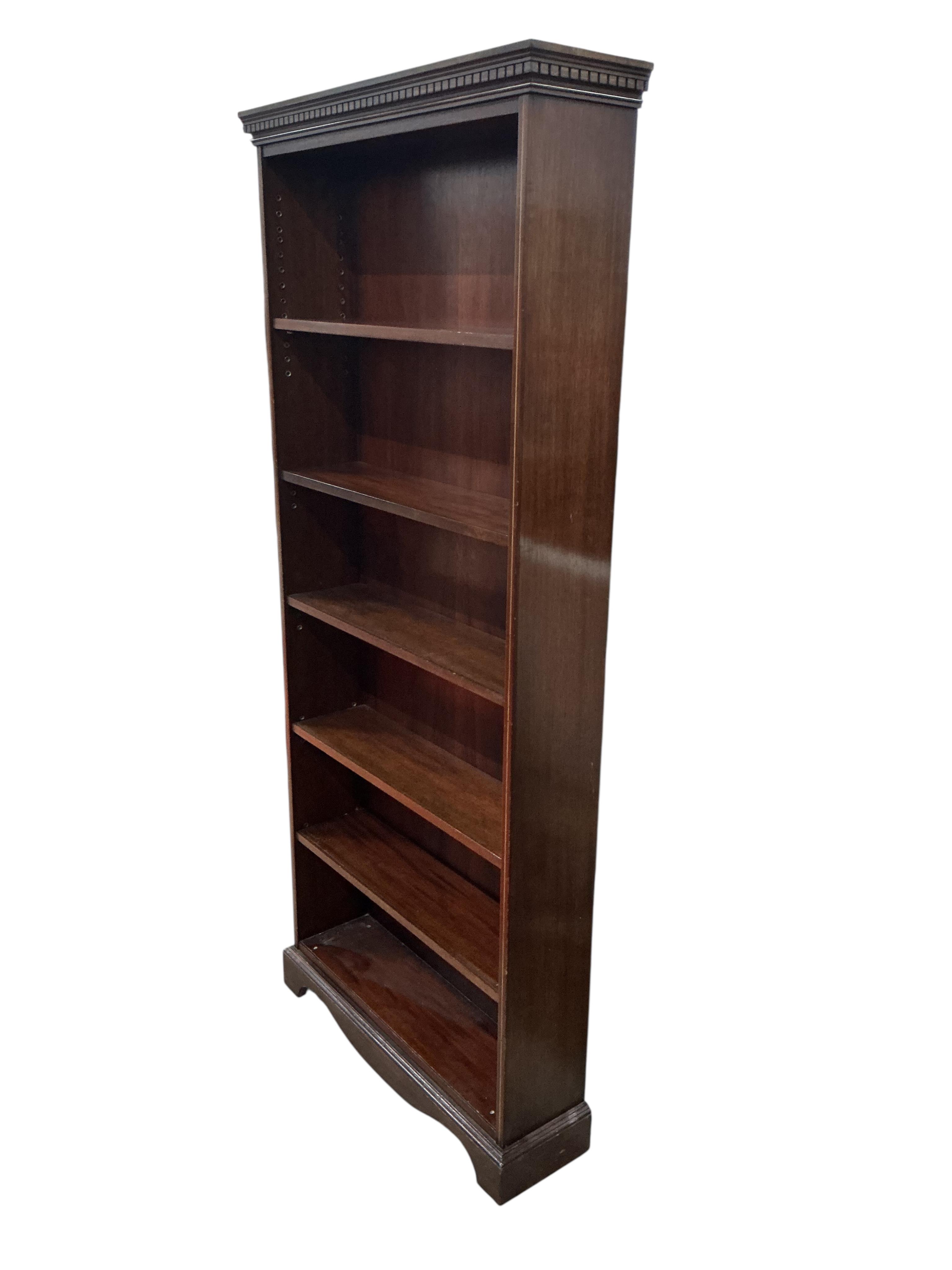 A reproduction Edwardian style mahogany open bookcase, width 79cm, depth 22cm, height 182cm